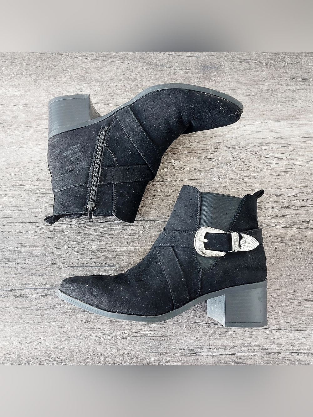 Black heeled fall boots with silver buckle